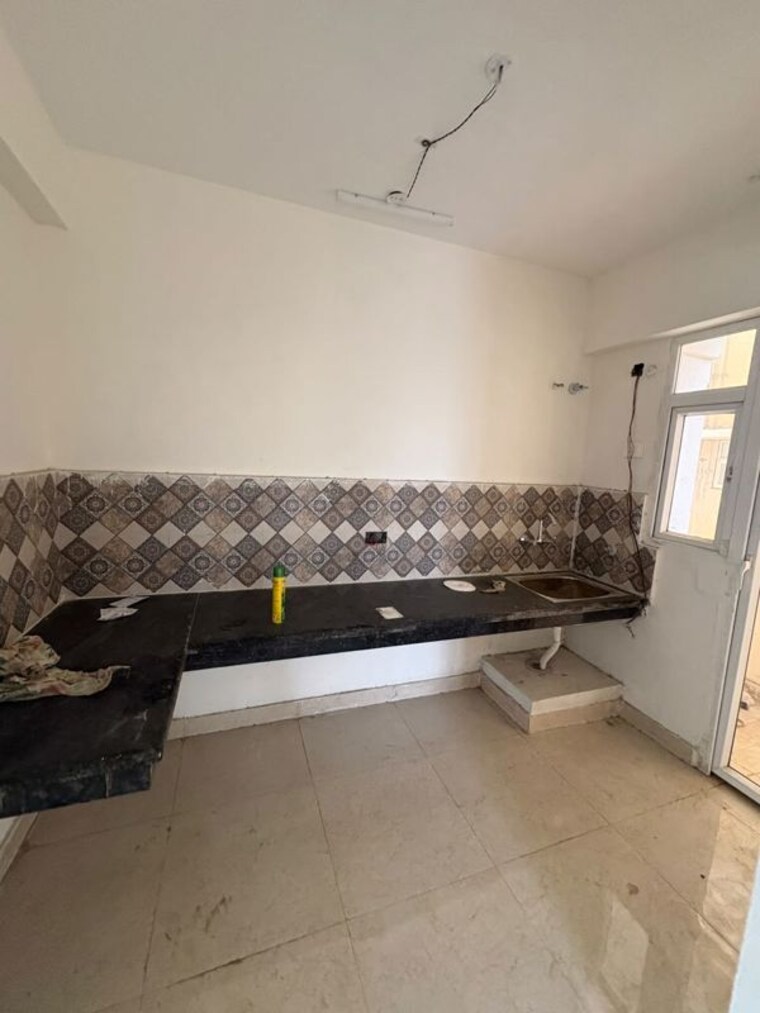 Kitchen, signature-the-millennia-3 2 Bedroom 1000 Sq.Ft. Apartment In Sector 37d Gurgaon 10556946