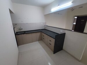 Kitchen in 3 BHK Apartment at Sai Samarttha Saisha, Punawale – for Rent