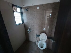Bathroom in 3 BHK Apartment at Sai Samarttha Saisha, Punawale – for Rent