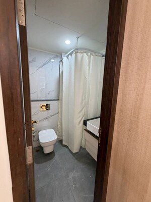 Bathroom in 3 BHK Apartment at Smart World Orchard, Sector 61 – for Rent