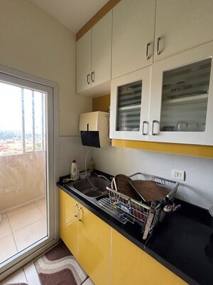 Kitchen in 3 BHK Apartment at Bhartiya Nikoo Homes, Thanisandra Main Road – for Rent