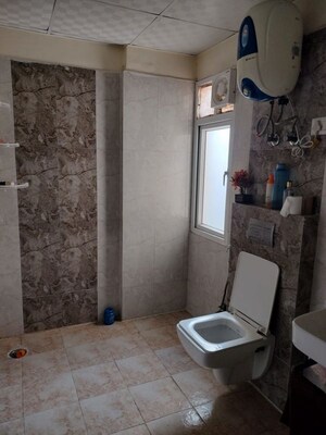 Bathroom in 3.5 BHK Apartment at Mahagun Moderne, Sector 78 – for Rent