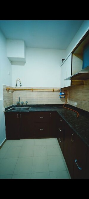 Kitchen in 2 BHK Apartment at Grah Avas Green View Heights, Raj Nagar Extension – for Sale