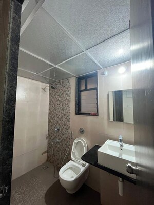Bathroom in 2 BHK Apartment at Kohinoor Coral Phase 3, Hinjewadi – for Rent