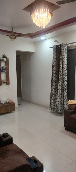 Living Room in 2 BHK Apartment at Royal Ishana, Thergaon – for Sale