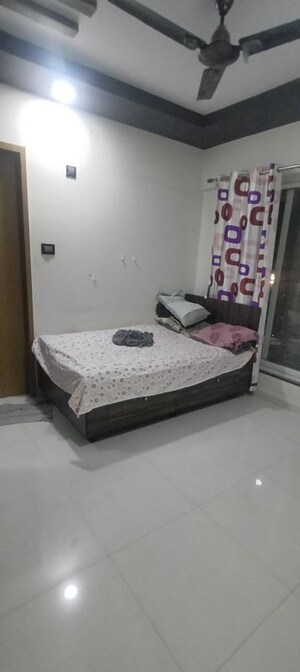 Bedroom in 2 BHK Apartment at Royal Ishana, Thergaon – for Sale