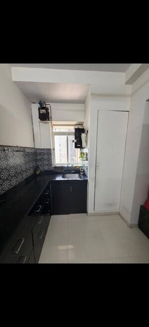 Kitchen in 1.5 BHK Apartment at Lodha Amara, Kolshet Road – for Rent