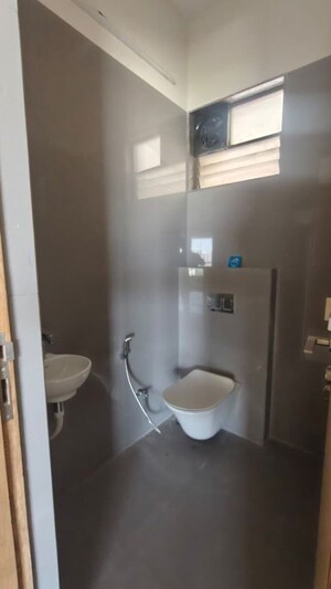 Bathroom in 3 BHK Apartment at Elite Neptune, Chharodi Village – for Rent