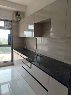 Kitchen in 2 BHK Apartment at Veena Smart Homes, Kandivali West – for Rent