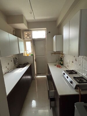 Kitchen in 4 BHK Apartment at The Divyalok Apartment, Sector 21d – for Sale