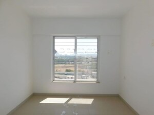 Room in 2 BHK Apartment at Kolte Patil Little Earth, Kiwale – for Rent
