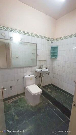 Bathroom in 2 BHK Apartment at Eros Sterling Apartments, Charmwood Village – for Rent