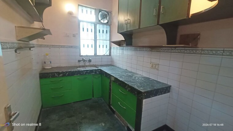 Kitchen, eros-sterling-apartments 2 Bedroom 950 Sq.Ft. Apartment In Charmwood Village Faridabad 10557640