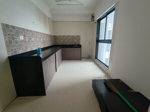Kitchen in 3 BHK Apartment at Raj Infinia, Malad West – for Rent