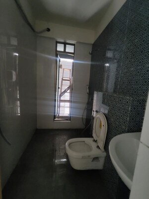 Bathroom in 3 BHK Apartment at Raj Infinia, Malad West – for Rent