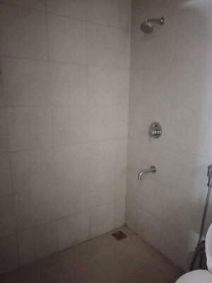 Bathroom in 3 BHK Apartment at Bhartiya Nikoo Homes Phase 2, Thanisandra Main Road – for Rent