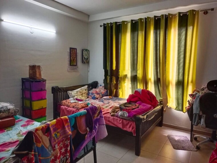 Bedroom, bhartiya-nikoo-homes-phase-2 3 Bedroom 1050 Sq.Ft. Apartment In Thanisandra Main Road Bangalore 10557801