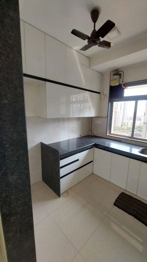 Kitchen in 3 BHK Apartment at Damji Shamji Mahavir Spring Tulip Phase 1, Pokhran Road No Two – for Rent