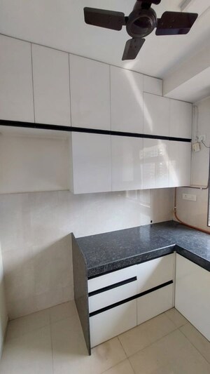 Kitchen in 3 BHK Apartment at Damji Shamji Mahavir Spring Tulip Phase 1, Pokhran Road No Two – for Rent