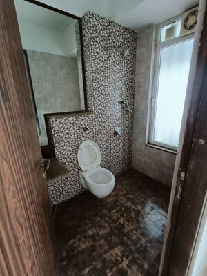 Bathroom in 2 BHK Apartment at Omkar Alta Monte, Malad East – for Rent