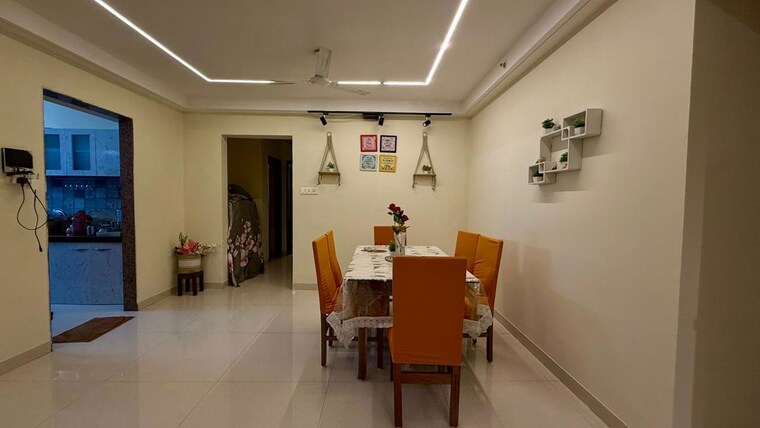 Living Room, paradise-lifespaces-sai-world-city 4 Bedroom 2500 Sq.Ft. Apartment In New Panvel Navi Mumbai 10557843