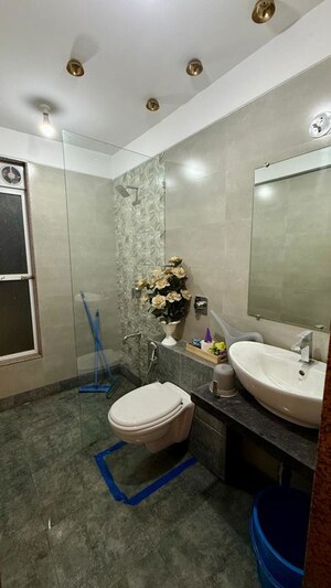 Bathroom in 4 BHK Apartment at Paradise Lifespaces Sai World City, New Panvel – for Rent