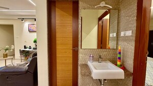 Bathroom in 4 BHK Apartment at Paradise Lifespaces Sai World City, New Panvel – for Rent