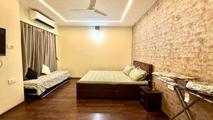 Living Room in 4 BHK Apartment at Paradise Lifespaces Sai World City, New Panvel – for Rent
