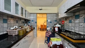 Kitchen in 4 BHK Apartment at Paradise Lifespaces Sai World City, New Panvel – for Rent