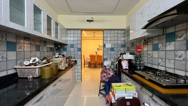Kitchen, paradise-lifespaces-sai-world-city 4 Bedroom 2500 Sq.Ft. Apartment In New Panvel Navi Mumbai 10557843