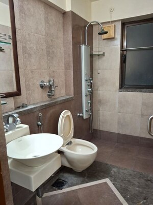 Bathroom in 3 BHK Apartment at Omkar Alta Monte, Malad East – for Rent