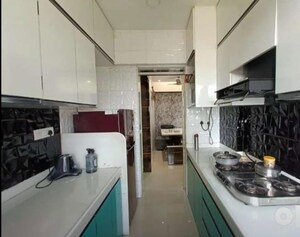 Kitchen in 2 BHK Apartment at Metropolis Rivera, Kasarvadavali – for Rent