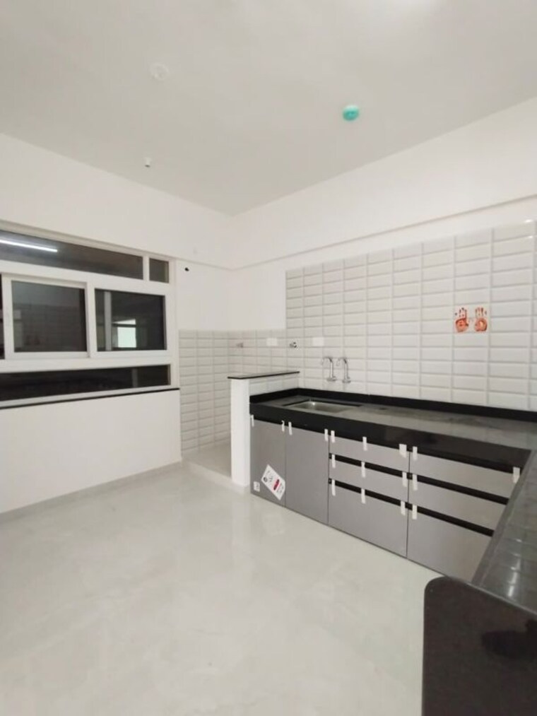Kitchen, nyati-exuberance-1 2 Bedroom 1100 Sq.Ft. Apartment In Undri Pune 10363415