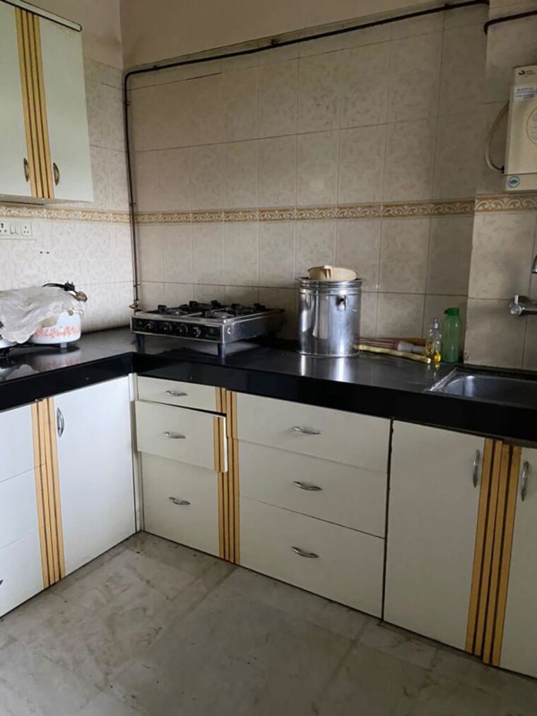Kitchen, vikash-complex-chs 2 Bedroom 910 Sq.Ft. Apartment In Uthalsar Thane 10558022