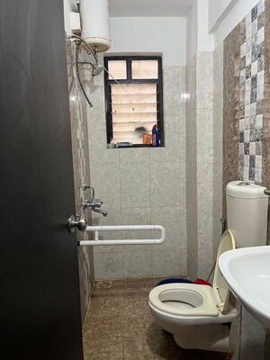 Bathroom in 2 BHK Apartment at Satyam Serenity, Wadgaon Sheri – for Rent