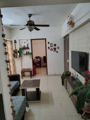 Living Room in 2 BHK Apartment at Nisarg Vishwa, Wakad – for Rent