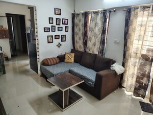 Living Room in 2 BHK Apartment at Nisarg Vishwa, Wakad – for Rent