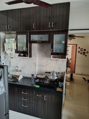 Kitchen in 2 BHK Apartment at Nisarg Vishwa, Wakad – for Rent