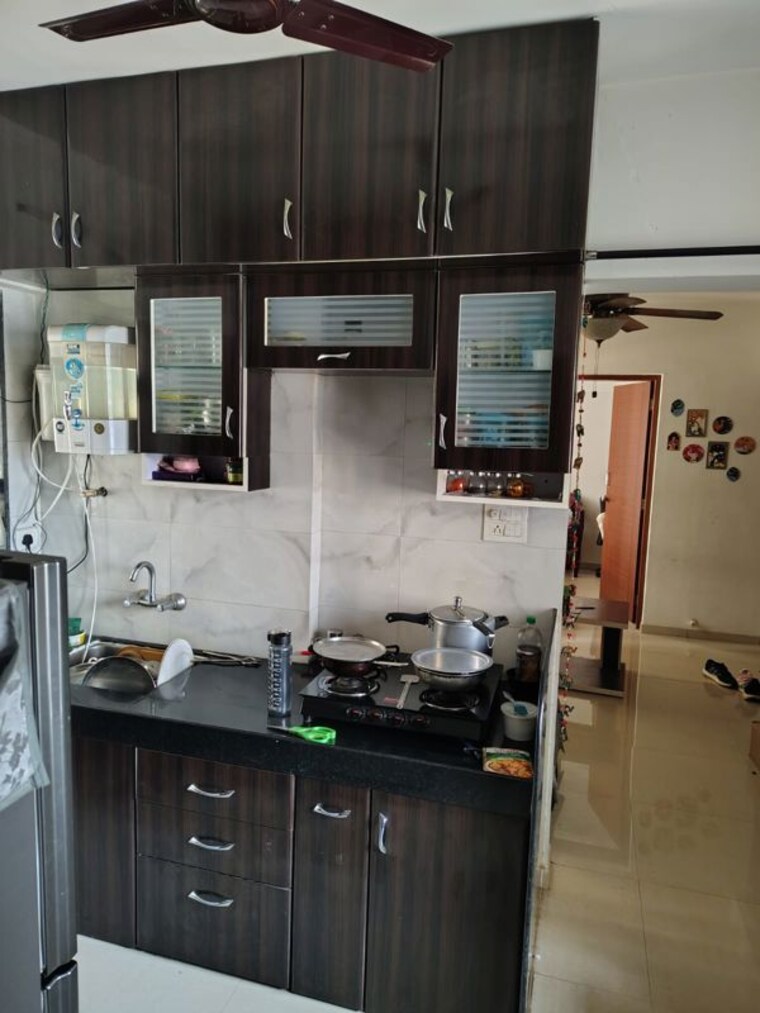 Kitchen, nisarg-vishwa 2 Bedroom 750 Sq.Ft. Apartment In Wakad Pune 10558165