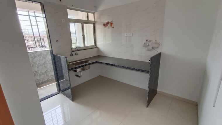 Kitchen, sus 1 Bedroom 580 Sq.Ft. Apartment In Sus Pune 10558160