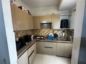 Kitchen in 2 BHK Apartment at Arihant Amber, Sector 1 Greater Noida – for Sale
