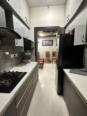 Kitchen in 3 BHK Apartment at Mahagun Mezzaria, Sector 78 – for Rent