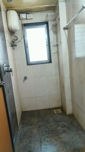 Bathroom in 1 BHK Apartment at Neelkanth CHS, Santacruz East – for Rent