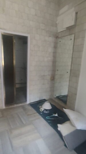 Room in 2 BHK Apartment at Bandra West – for Rent