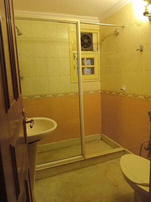 Bathroom in 3 BHK Apartment at Vasant Kunj – for Rent
