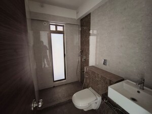 Bathroom in 2 BHK Apartment at Raj Infinia, Malad West – for Rent