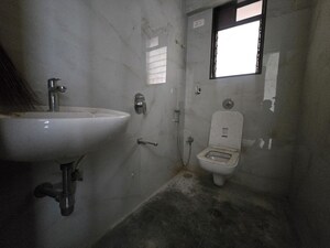 Bathroom in 1 BHK Apartment at Shwetambara CHS, Kandivali West – for Sale