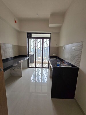 Kitchen in 3 BHK Apartment at Lodha Woods, Kandivali East – for Rent