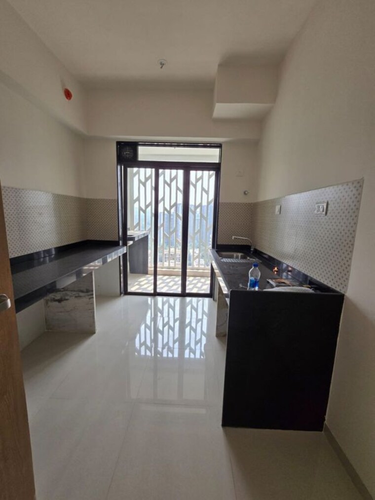 Kitchen, lodha-woods 3 Bedroom 1000 Sq.Ft. Apartment In Kandivali East Mumbai 10558434