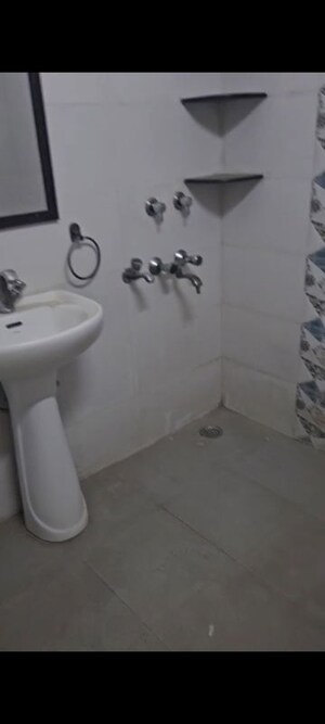 Bathroom in 3 BHK Apartment at Arun Vihar Sector 37, Sector 37 – for Rent